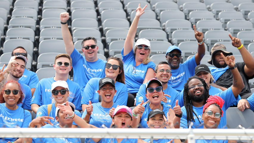 People cheering in the stands