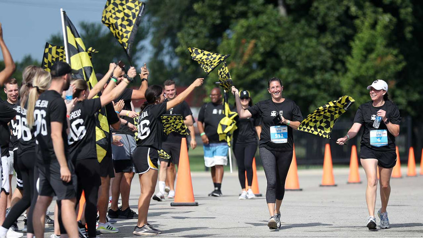 people coming into finish at a race