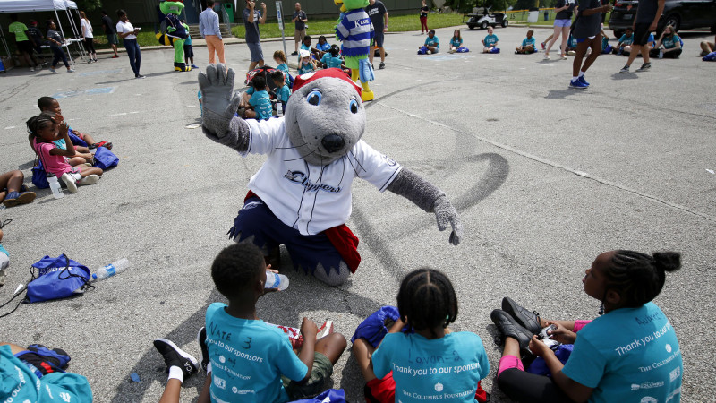 kids hanging out with mascot