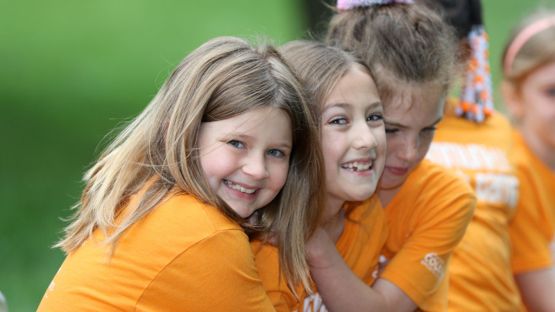 kids smiling and hugging