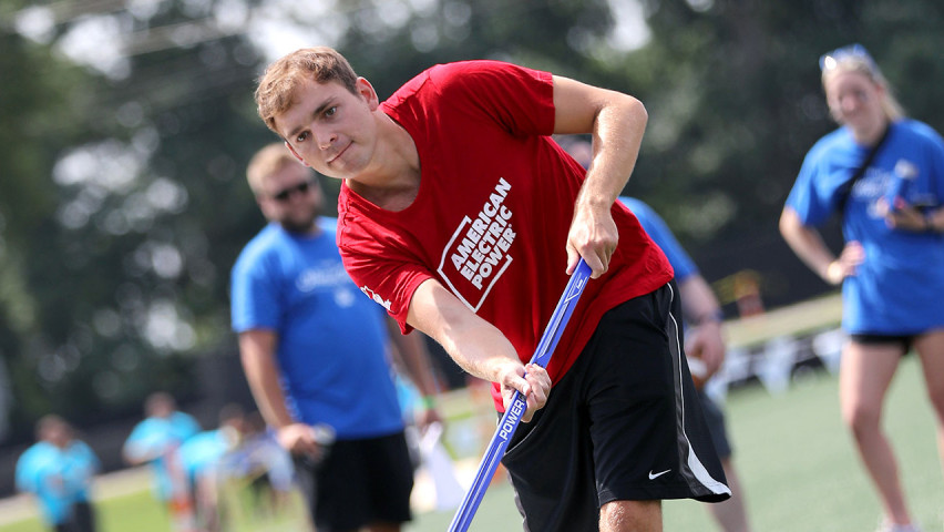Man participating in field hockey event